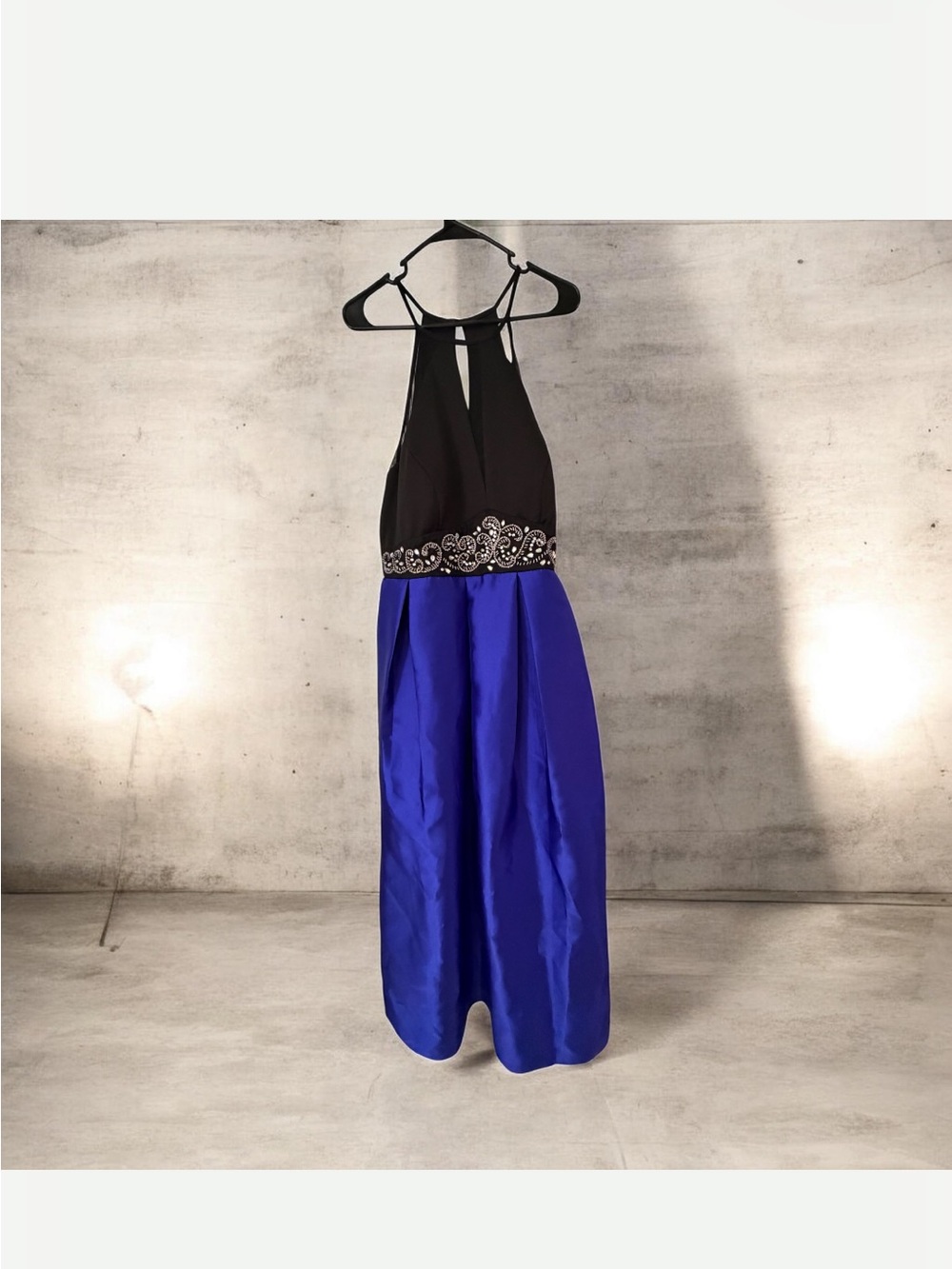 Formal dress made by Teeze Me Black and Royal blue . Has pockets
